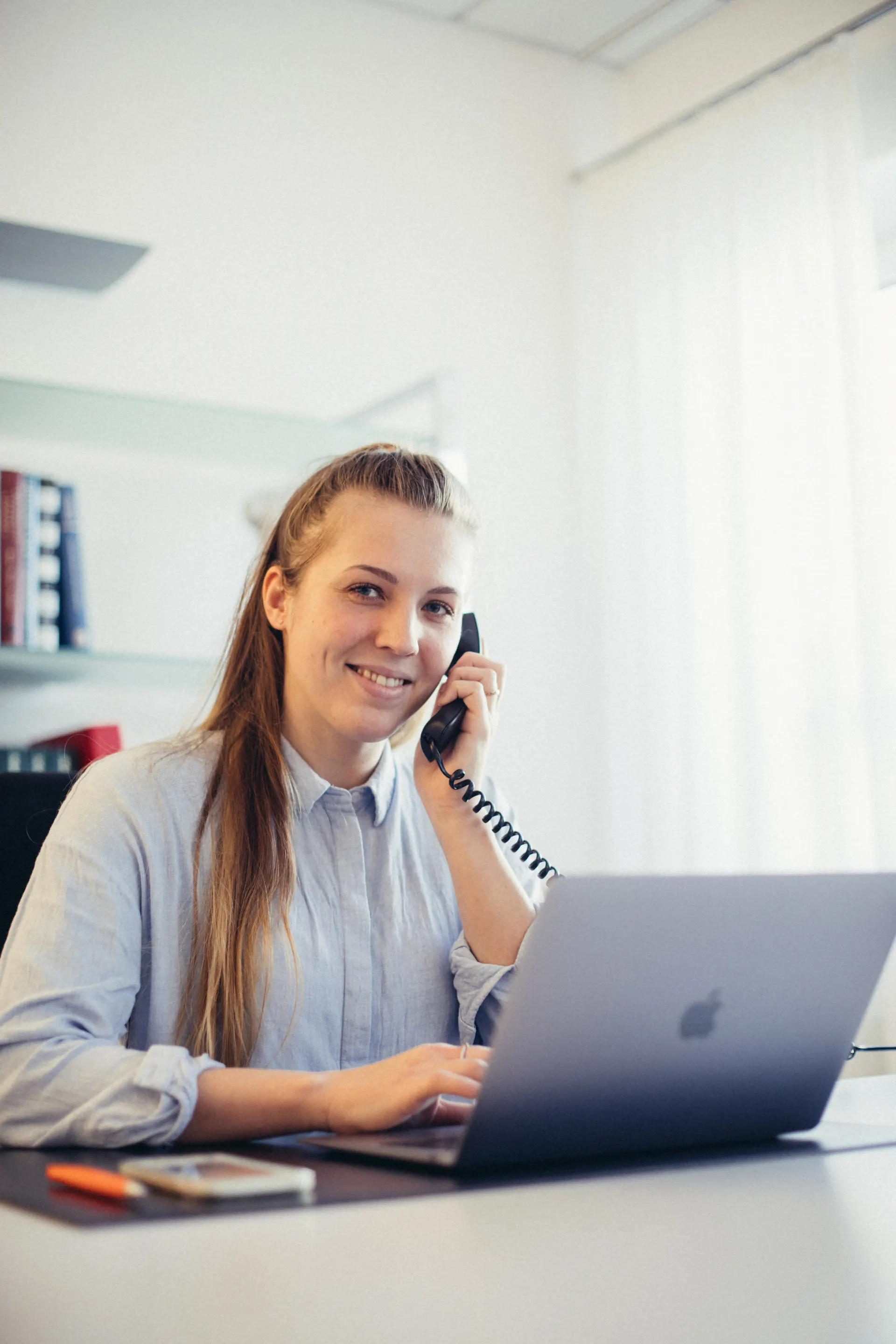 360° coach van Weight Doctors® aan de telefoon