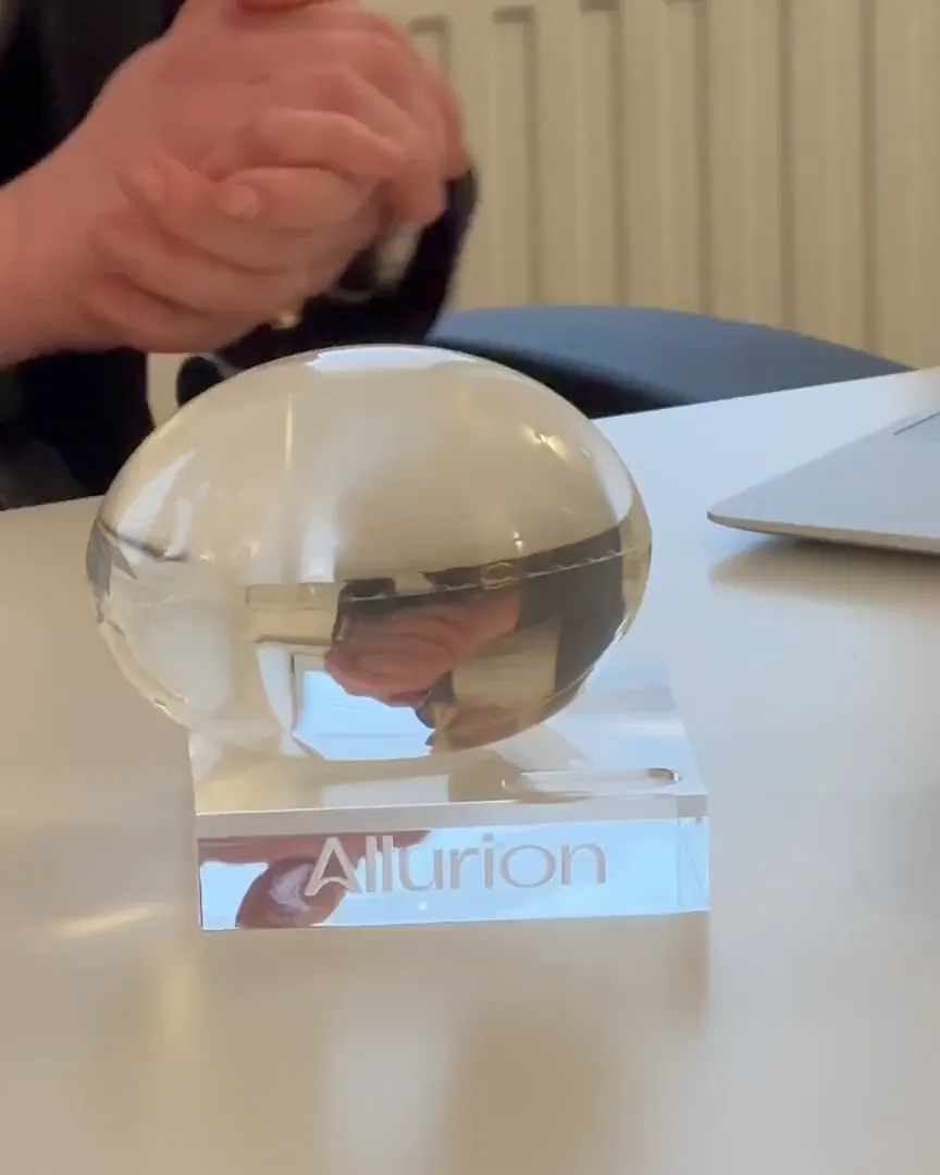 Filled gastric balloon in a glass block on the consultation table at Weight Doctors®